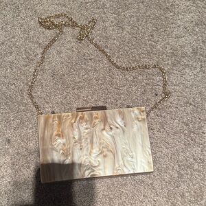 Elegant Cream Clutch with Gold Chain